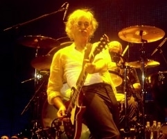 Jimmy Page playing a guitar solo
