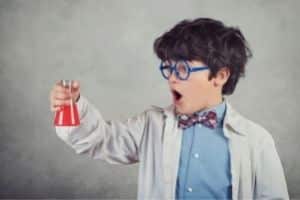 A boy conducting an experiment