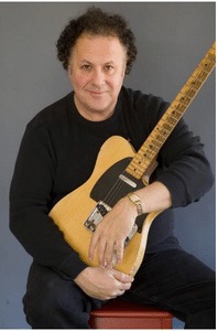 Best Telecaster Players - A portrait of Arlen Roth holding a Telecaster.