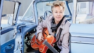 Gotta Have The Rumble - Brian Setzer sitting in his car, with his guitar