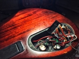Guitar Repair Maintenance Kit – A guitar with active electronics