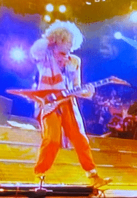 Van Halen Live Without A Net DVD - Sammy playing a Flying V guitar