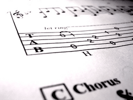 Learning Guitar For Seniors - A music sheet with accompanying tablature (TAB).