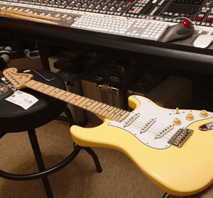 Humbucker Pickups Vs Single Coil - A Stratocaster with single coil pickups in a recording studio
