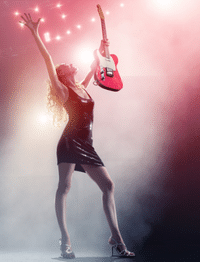Buying A Guitar In A Guitar Store – A woman onstage playing an electric guitar.