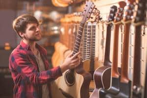 Online Guitar Shopping - Trying an acoustic guitar at a music store.