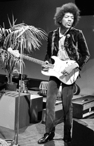 Can You Change A Right Handed Guitar To Left Handed – A photo of Jimi Hendrix playing his guitar