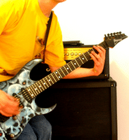 Super Strat Guitars - A photo of someone shredding guitar