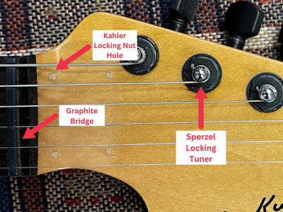 Are Locking Tuners Worth It - Strat headstock with Kahler locking tuner removed, graphite nut, and locking tuners