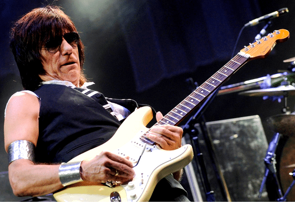 What Makes A Guitarist Unique - Jeff Beck playing his guitar on stage