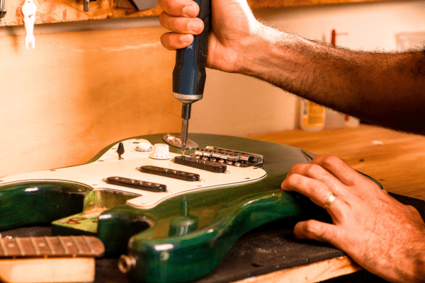 Are Cheap Electric Guitars Harder To Play - An electric guitar getting a complete setup