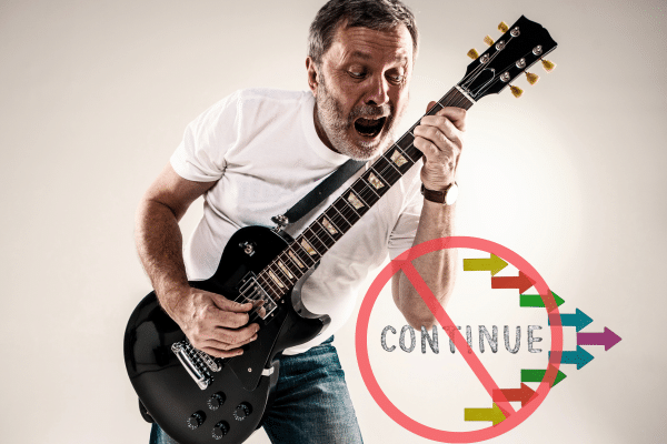 How To Reduce Sustain On An Electric Guitar - A man trying to sustain notes on an electric guitar.