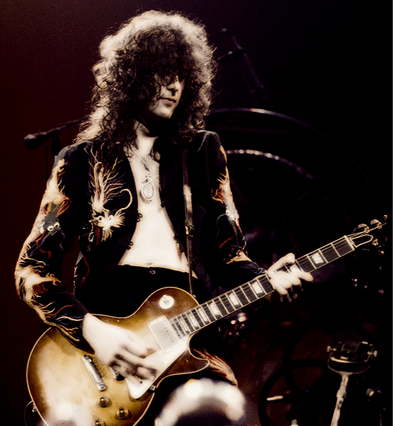 Les Paul Vs Stratocaster - Jimmy Page playing a Les Paul guitar onstage